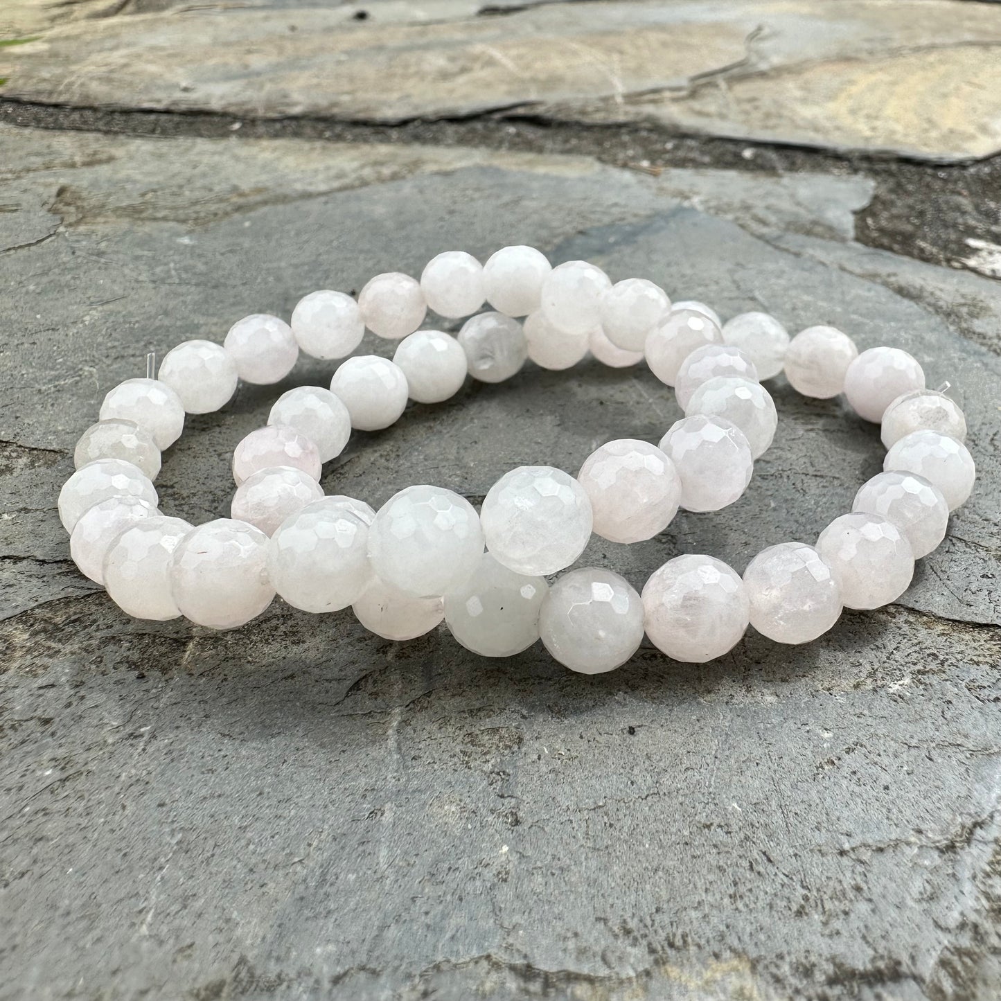 Feel Centred and Loved rose quartz bracelet with soft pink polished beads, designed to promote love, calm, and emotional balance. Handmade in New Zealand.