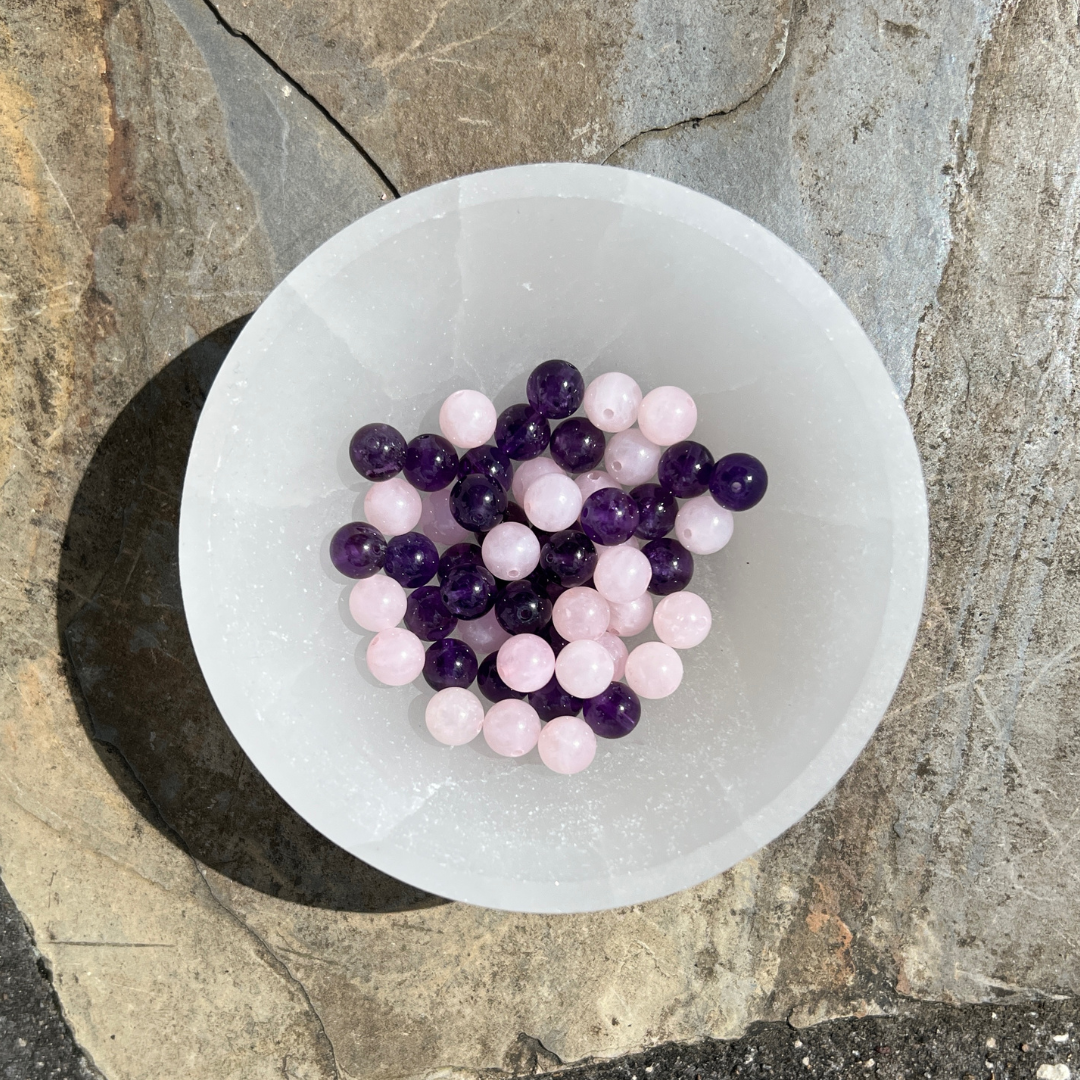 Sweet Dreams bracelet with soft pink Rose Quartz and calming purple Amethyst beads, designed to promote restful sleep, emotional healing, and inner peace. Handmade in NZ.