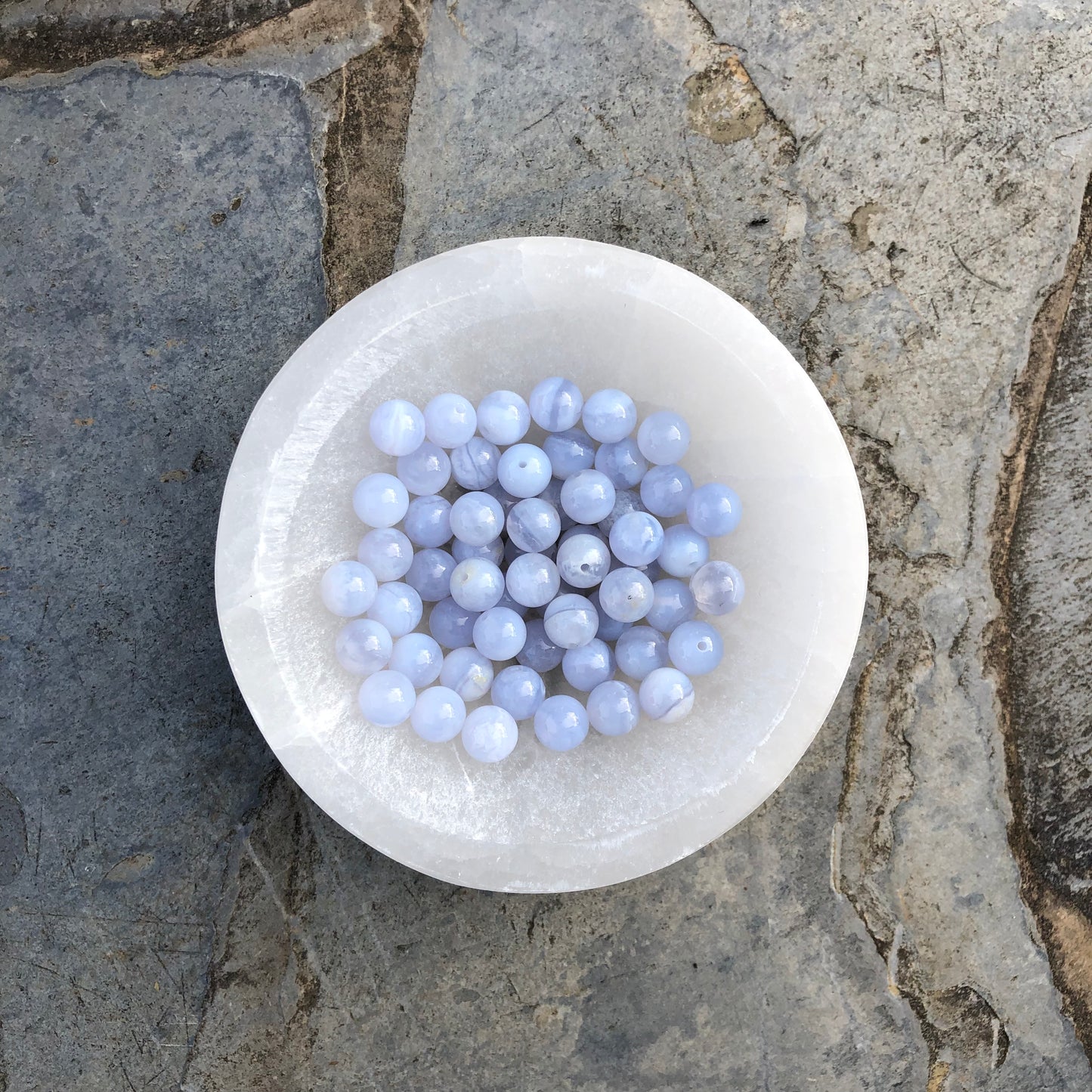 Bracelet made from pale blue and white Blue Lace Agate beads, designed to promote calmness, self-expression, and emotional balance.