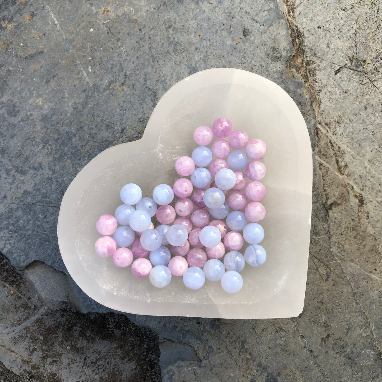 Bracelet made from soft pink kunzite and pale blue lace agate beads, designed for calm, communication, and emotional wellness.