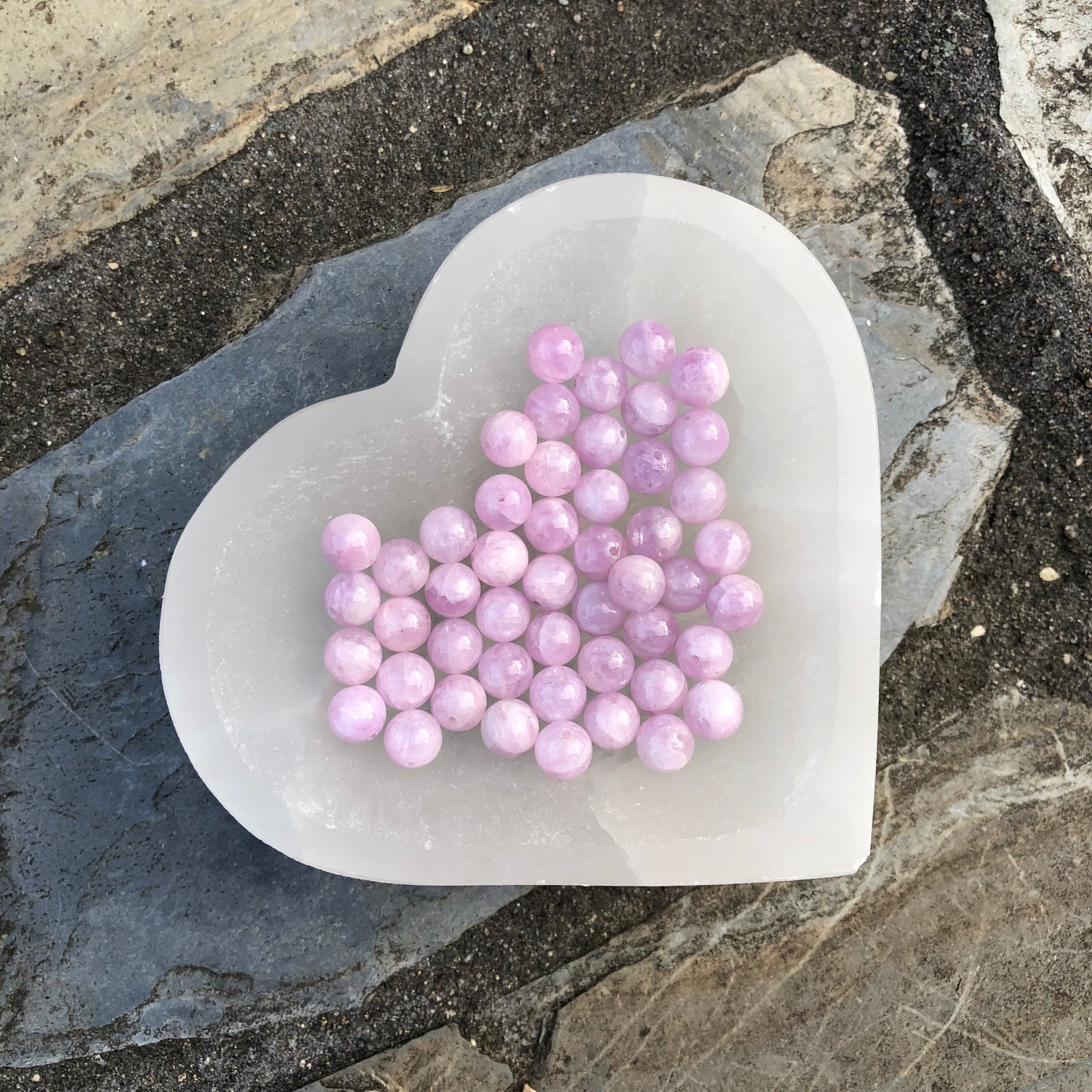 Pink to lilac Kunzite crystal bracelet, designed to promote emotional healing, universal love, and spiritual growth.