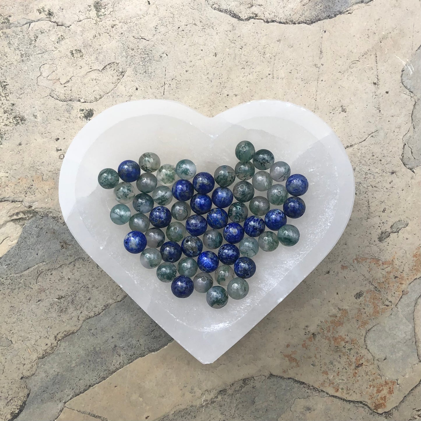 Handmade beaded bracelet featuring deep blue Lapis Lazuli and earthy green Moss Agate stones for emotional balance, clarity, and vitality.