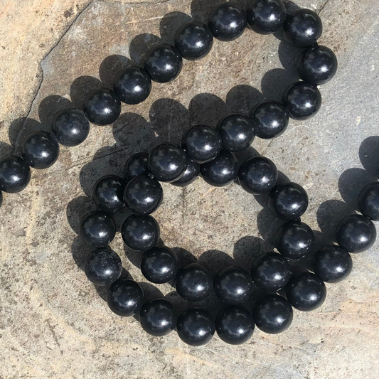 Shielding Shungite bracelet featuring polished black Shungite beads, designed for EMF protection, detoxification, and grounding. Handmade in NZ.