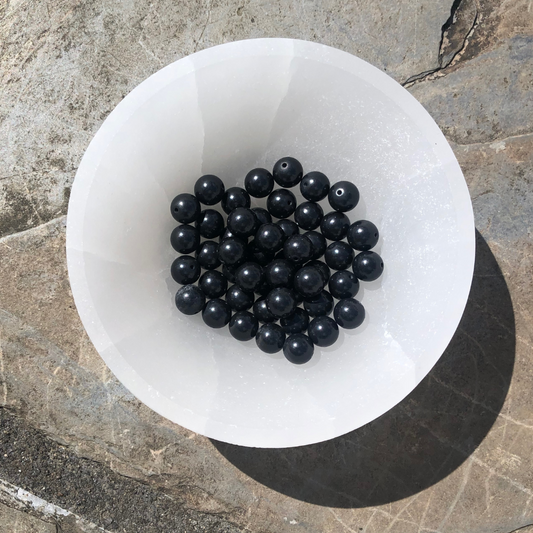 Shielding Shungite bracelet featuring polished black Shungite beads, designed for EMF protection, detoxification, and grounding. Handmade in NZ.