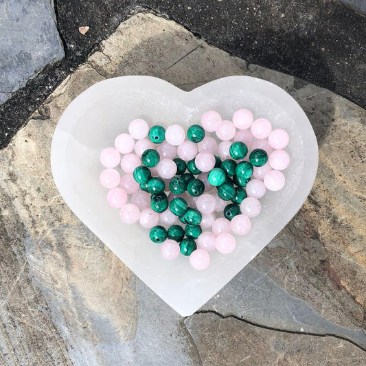 Love and Forgive Yourself bracelet featuring soft pink Rose Quartz and vibrant green Malachite beads for emotional healing, self-love, and transformation. Handmade in NZ.